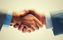 handshake between lawyer and client